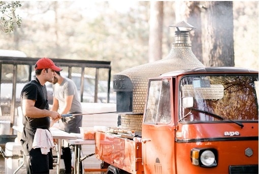 Catering event with mobile pizza oven